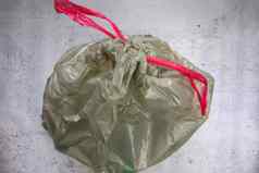 绿色塑料垃圾袋塑料浪费准备好了回收浪费管理前视图