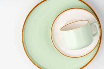 集白色柔和的绿色<strong>陶瓷餐具</strong>橙色概述了