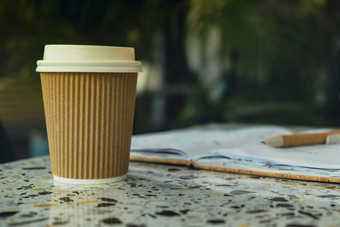 热拿铁咖啡工艺回收纸杯纸笔记本咖啡打破在线工作研究联合办公空间纸杯咖啡馆表格自由工作空间笔记本咖啡富有成效的工作研究工作舒适模型