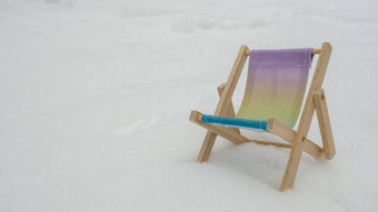 圣诞节背景太阳<strong>懒人</strong>海滩椅子雪冬天假期概念复制空间文本广告的地方放松