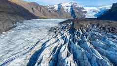 瓦特纳冰川冰川冰岛纯蓝色的冰纹理冬天季节空中前视图景观