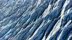 瓦特纳冰川冰川冰岛纯蓝色的冰纹理冬天季节空中前视图景观