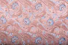 mbroidered模式背景观赏花粉红色的背景美丽的模式点缀绣花蓝色的花时尚设计