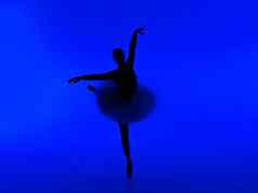 美丽的轮廓芭蕾舞女演员蓝色的背景跳舞芭蕾舞舞者图图
