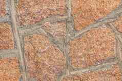 红色的棕色（的）石头鹅卵石墙纹理背景