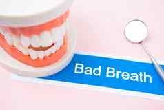 牙齿模型坏呼吸牙科疾病粉红色的颜色背景