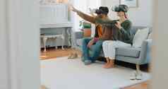 玩家夫妇元宇宙未来主义的科技沙发生活房间网络游戏游戏未来媒体虚拟现实视频游戏的电子竞技技术数字有趣的在线幻想
