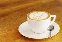 咖啡拿铁木表格古董咖啡馆杯餐厅平原背景快报厨房喝牛奶泡沫复古的用餐者早餐早....爱