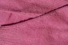 绑带粉红色的毛衣丙烯酸羊毛毛衣清洁收集绒毛线头特写镜头公益诉讼毛衣毛衣线头抗起球恢复损坏的衣服护理修复织物