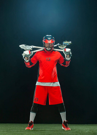 长曲棍球球员运动员运动员红色的头盔黑色的背景体育运动动机图片