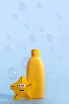 空瓶婴儿洗过来这里浴泡沫液体肥皂洗发水黄色的明星鱼飞行肥皂泡沫孩子们的卫生模板设计