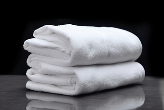 白色毛巾布草布料居家洗护用品酒店住宿洗手间摄影图
