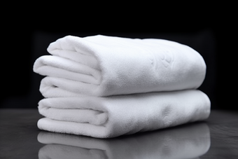 白色毛巾布草布料居家洗护用品旅店商务住宿洗手间摄影图