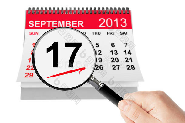 宪法日概念。2013年9月17日带放大镜的日历