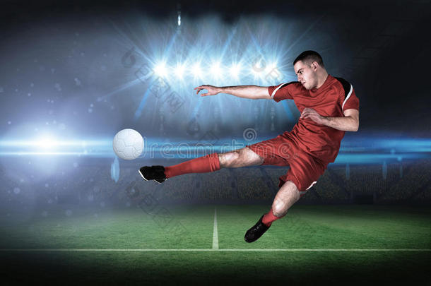 健康足球运动员踢球踢球的合成图像