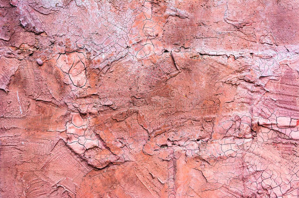 古董开裂的粉红色混凝土墙背景图片