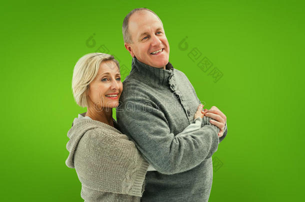 <strong>冬季服装</strong>中快乐成熟夫妇的复合图像