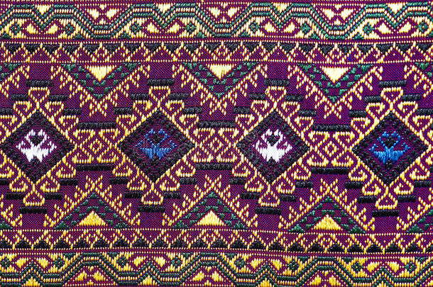 彩色泰国丝绸手工艺品秘鲁风格地毯表面关闭