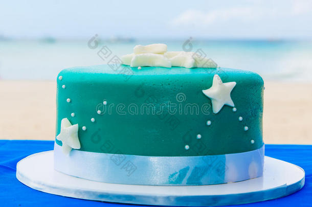 蓝色海滩主题婚礼<strong>蛋糕</strong>装饰海星。