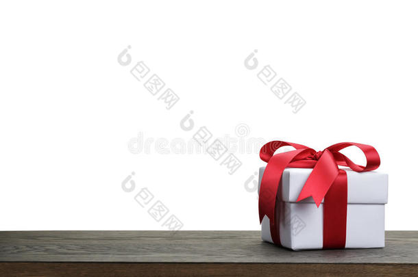 边框与白色礼品盒与红色丝带蝴蝶结