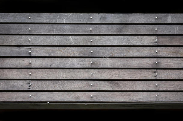 黑色木仓板粗糙的颗粒表面