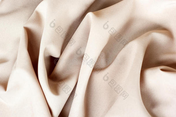 抽象背景豪华布或液体波浪或波浪褶皱，丝绸或缎子材料与波浪线