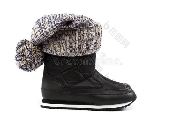 寒冷的冬季服装和鞋子-一顶莫特利针织帽子或帽子和