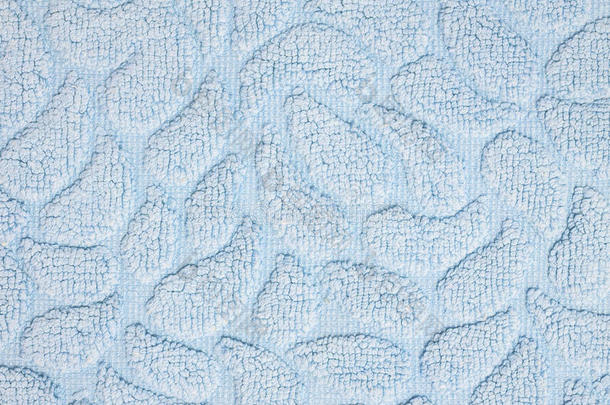 特写表面织物图案在旧蓝色织物垫纹理背景