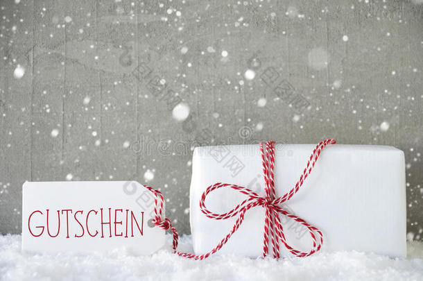 礼物，水泥背景与雪花，Gutschein意味着代金券