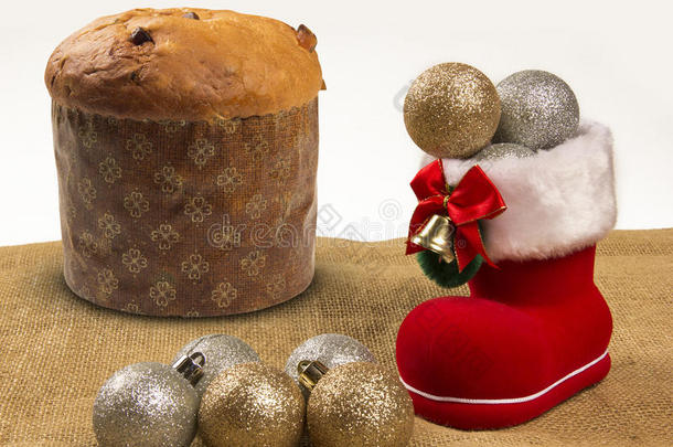 圣诞装饰与圣诞老人`靴子和帕内特甜点。