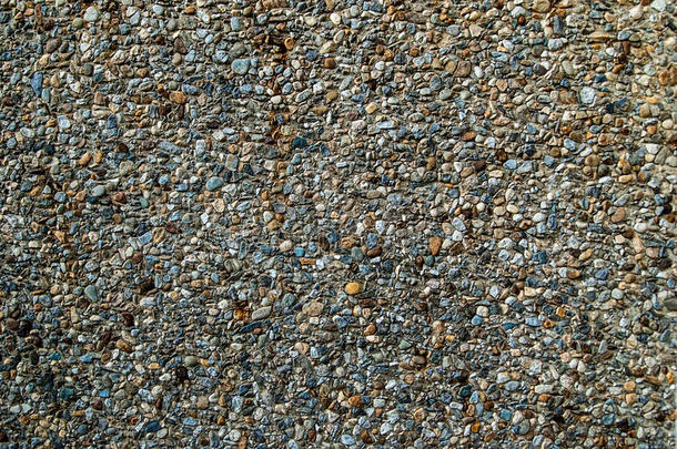 粉碎花岗岩砾石填充水泥表面作为背景纹理