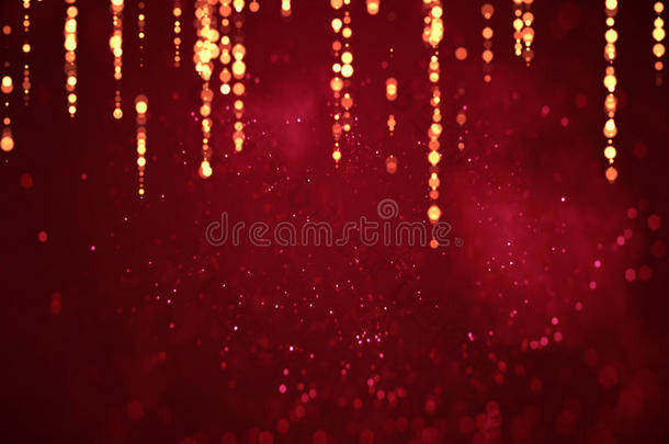 抽象圣诞渐变红色背景与Bokeh和黄金条，情人节爱情节日活动节日