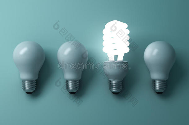 节能灯泡，一个发光的紧凑型荧光灯灯泡从未照明的白炽灯泡中脱颖而出