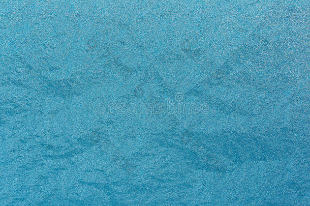 蓝色天然磨砂玻璃冰背景。 冬季圣诞节圣诞节