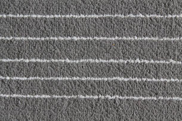 织地粗糙的织物灰色的背景和白色的台词为蜘蛛网地点或