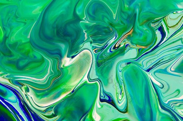 白色的,蓝色和绿色的颜色大理石混合的墨水抽象.