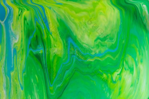 绿色的和蓝色颜色大理石混合的墨水抽象.