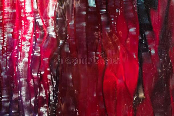 红色的红宝石玻璃织地粗糙的背景