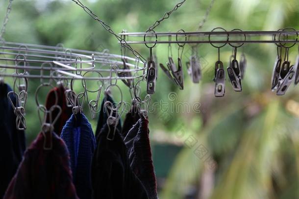 衬衣或衣服绞死采用金属给提供衣服sp采用f或干的干燥的给提供衣服