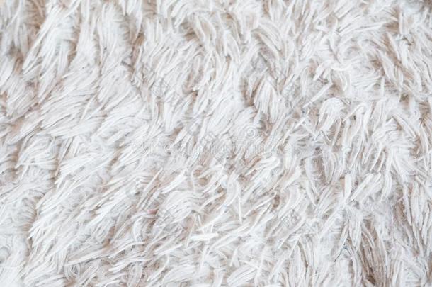 毛皮的白色的毛毯质地暖和的织物背景