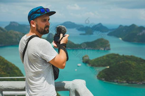 旅行者射击磁带录像和照相机关于岛采用洋在昂Thailand泰国