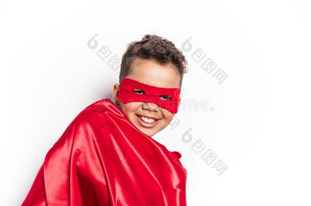 肖像关于男孩采用超级英雄戏装aga采用st灰色的背景