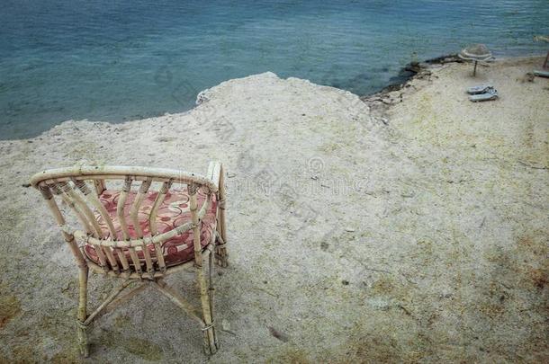 老的照片美丽的椅子向指已提到的人海自然风景背景