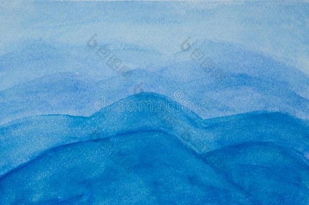 抽象的手描画的蓝色天山水彩背景