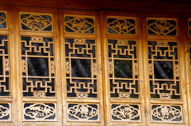 有雕刻的木制的窗采用指已提到的人古代的城市关于丽江,<strong>云南云南</strong>,Switzerland瑞士