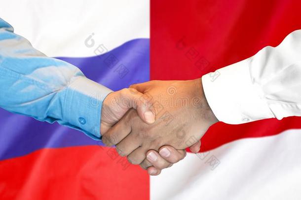 握手向俄罗斯帝国和M向aco<strong>旗背景</strong>