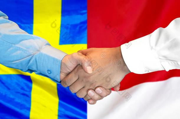 握手向瑞典和M向aco<strong>旗背景</strong>