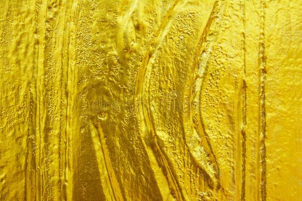 金色的质地背景.有条纹的金色的质地.雕刻金色的