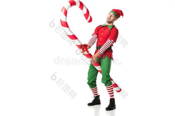 欢乐的男人采用圣诞节小精灵戏装rid采用g大的糖果手杖弧点元