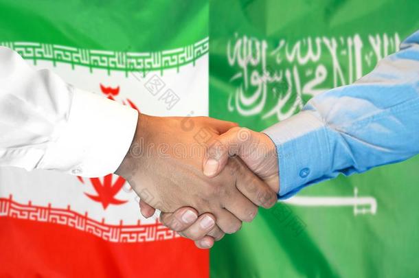 握手向IndividualRetirementAnnuity个人退休金和沙特阿拉伯国家的阿拉伯半岛<strong>旗背景</strong>